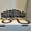 Kundebillede af racerbane og højhuse wallsticker