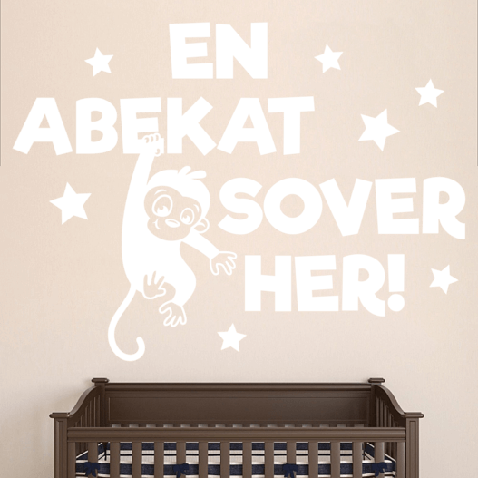 En abekat sover her Flot wallstickers til børneværelset