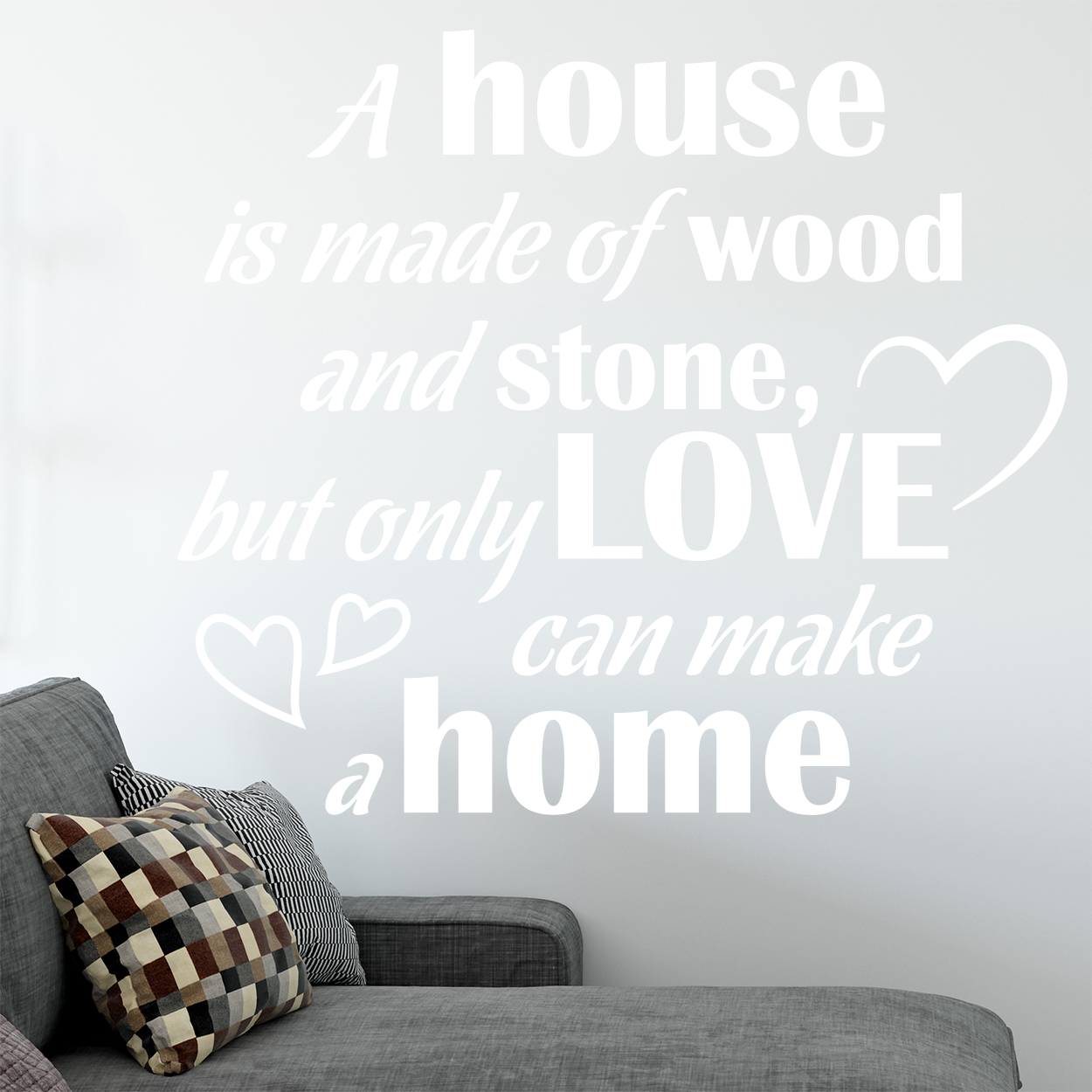 Wallsticker med teksten "A home is made of love". Flot wallstickers til bl.a. stuen.