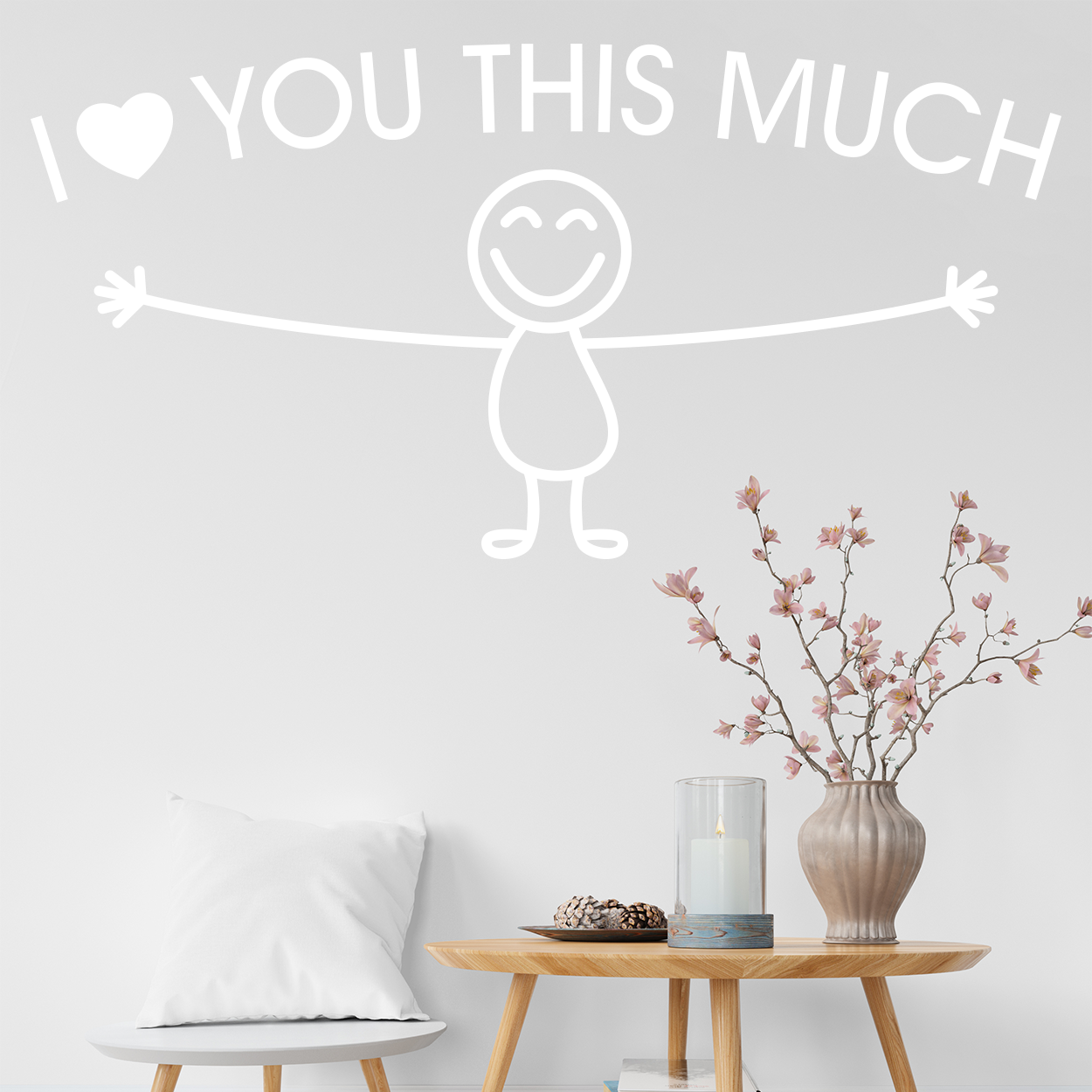 Wallsticker med teksten "I love you this much". Flot wallstickers til bla. stuen.