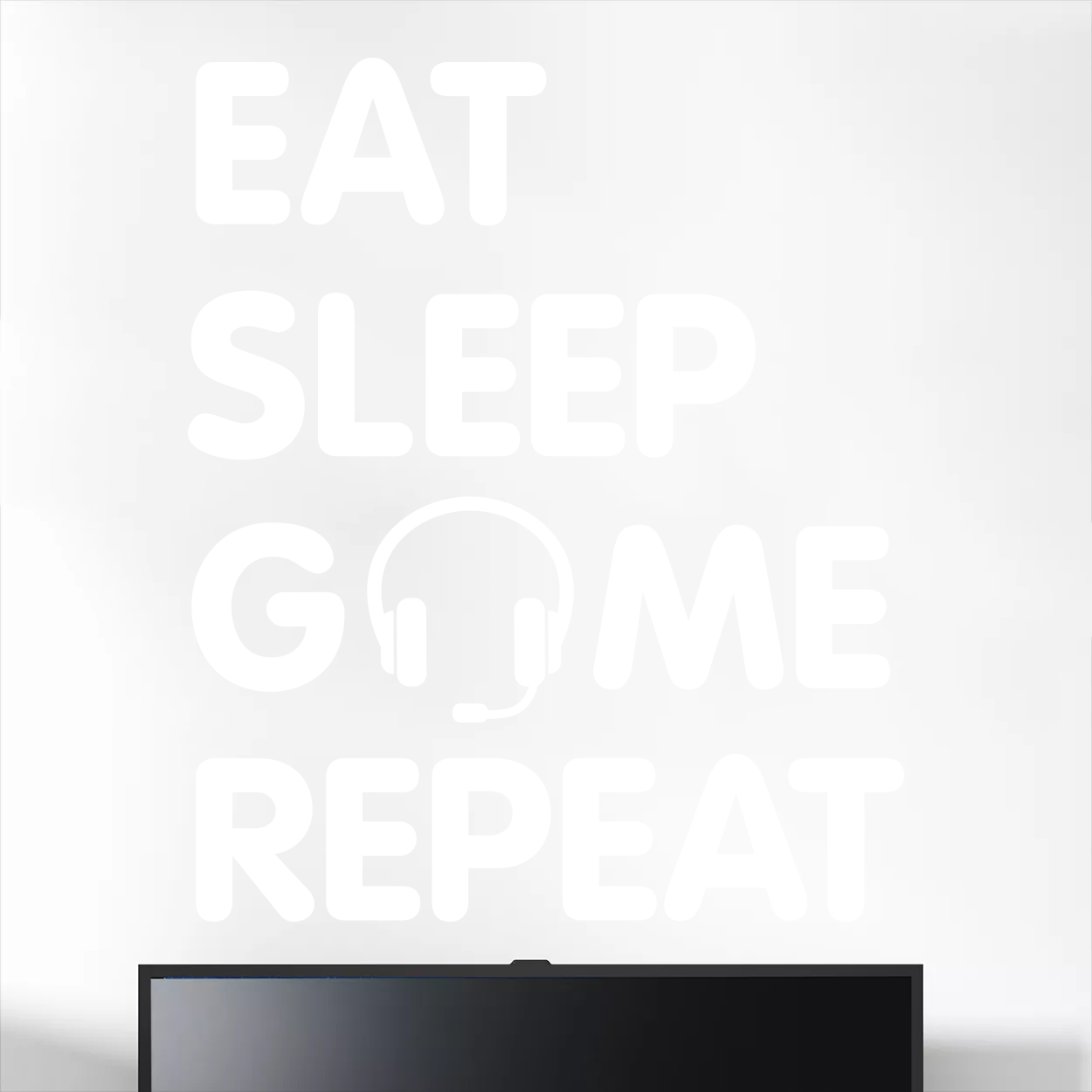 Wallsticker med teksten "Eat sleep game repeat"