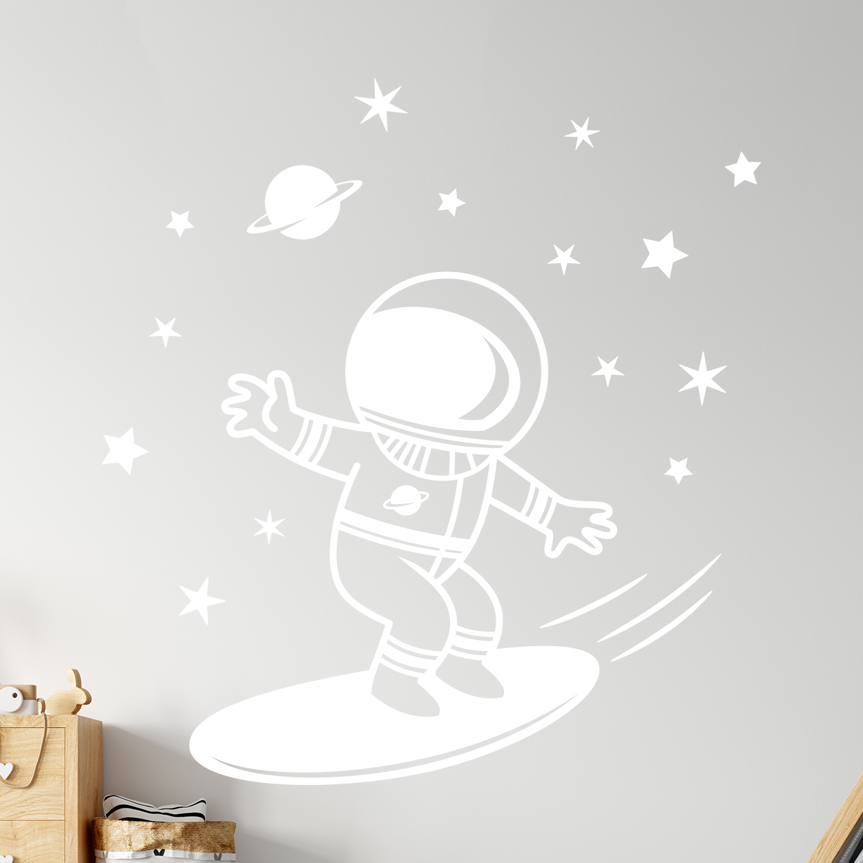 Wallsticker med astronaut der surfer