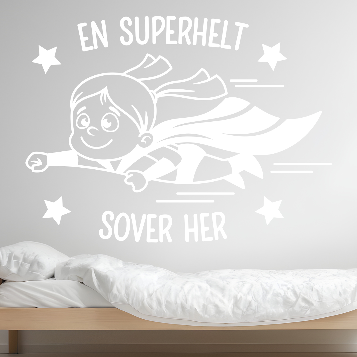 Wallsticker med en superhelt pige og teksten "En superhelt sover her"