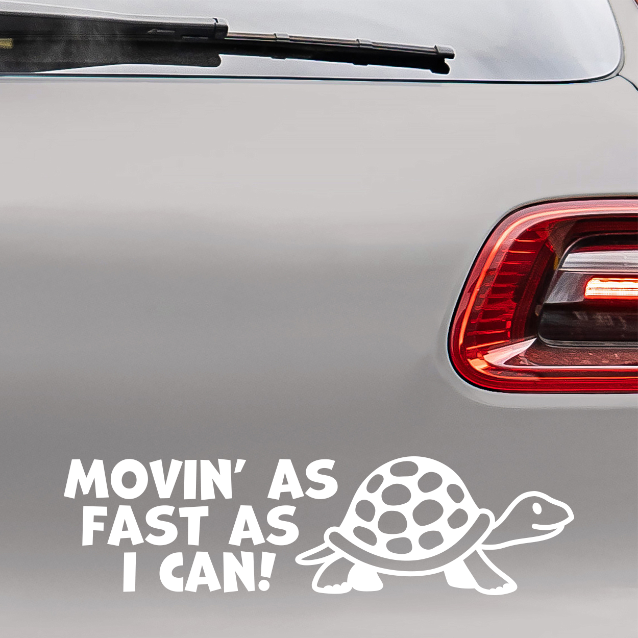 Bilsticker med teksten "Movin' as fast as i can!"